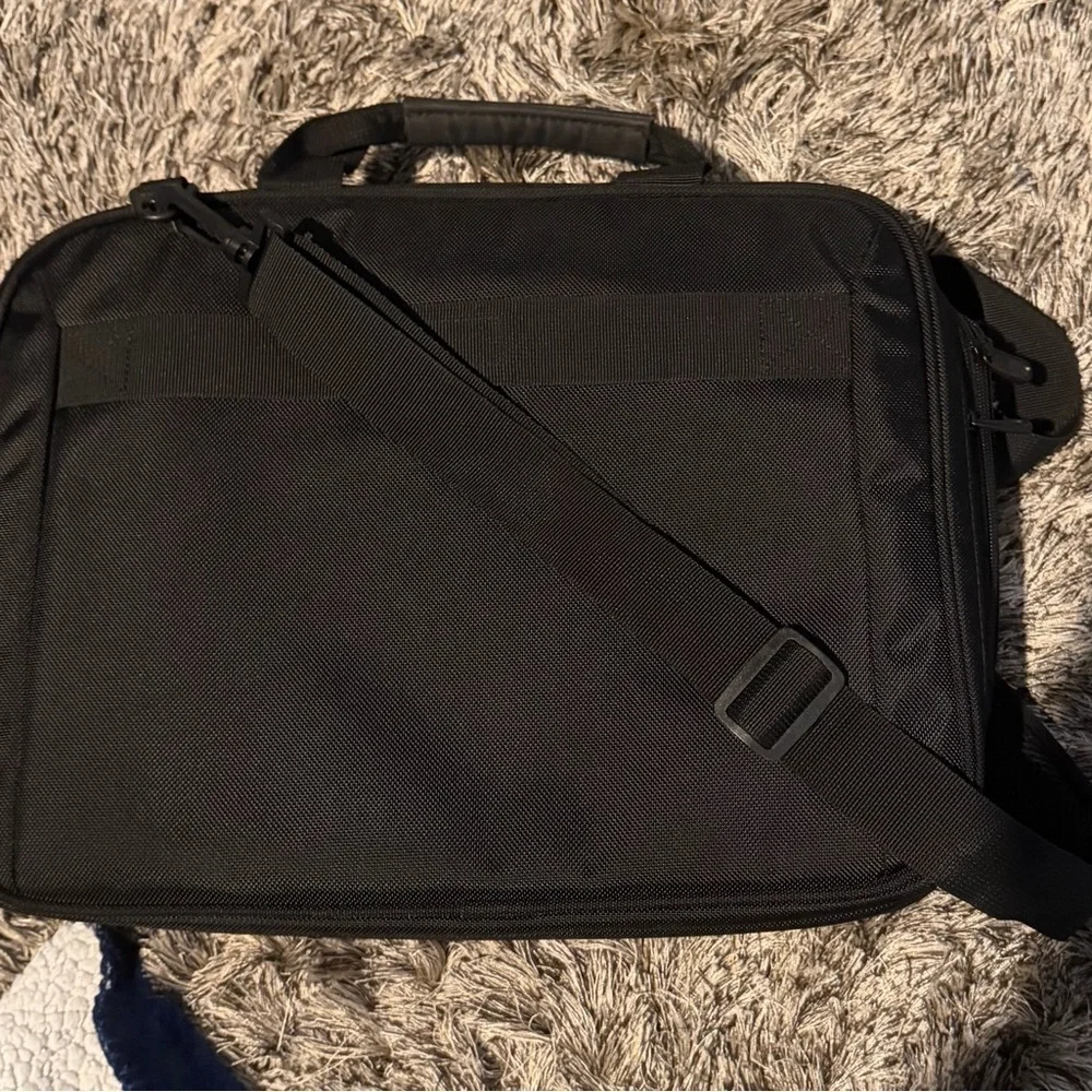 Targus Black Briefcase Laptop Case With Longstrap with 4 different compartments